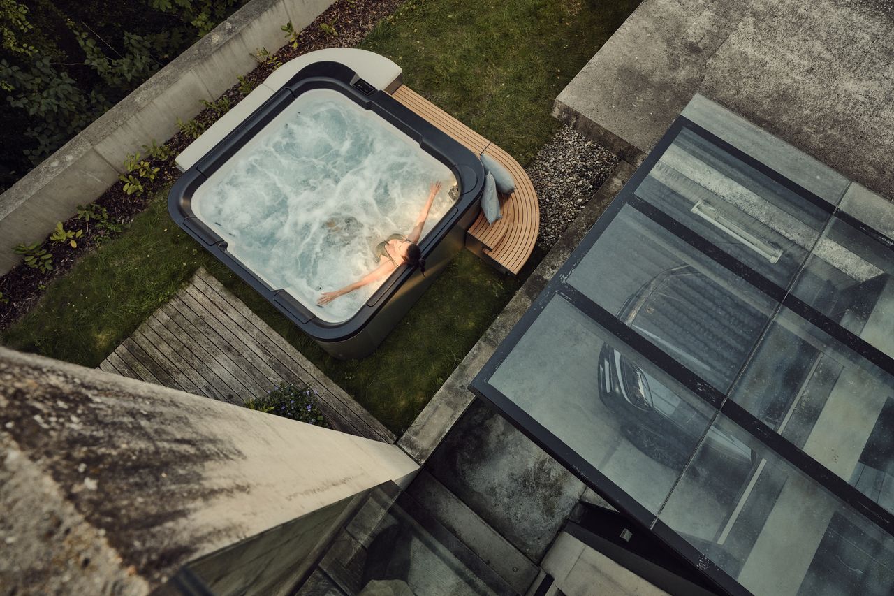 Aerial view of the SP—116 beside a glass-roofed garage