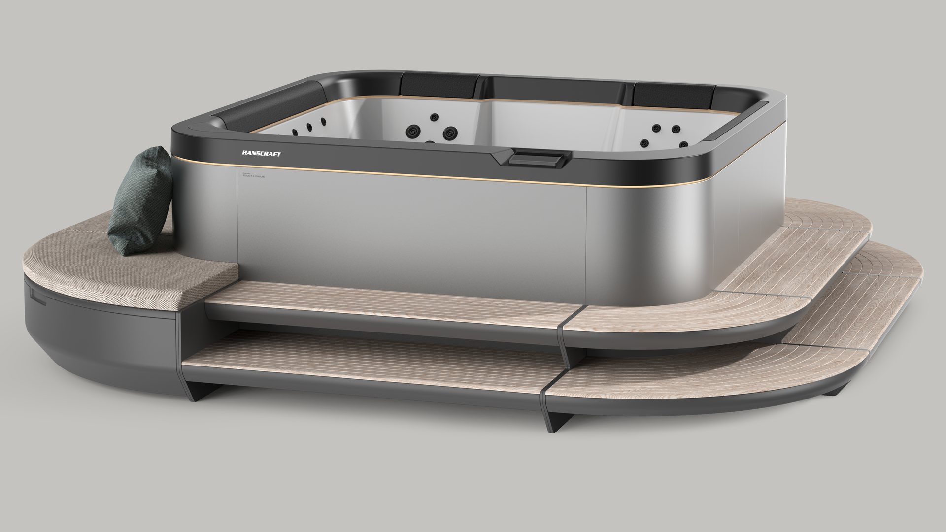 The spa on its modular island with bench and deck